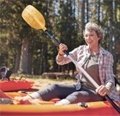 older woman - enjoying canoeing
