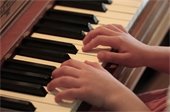 child playing piano