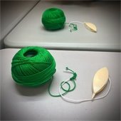 Green material and tool for shuttle tatting