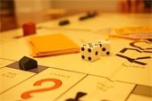 Monopoly board - dice - cards - game pieces