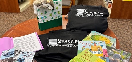 Storytime to go bags with books, puppet, felt pieces and board