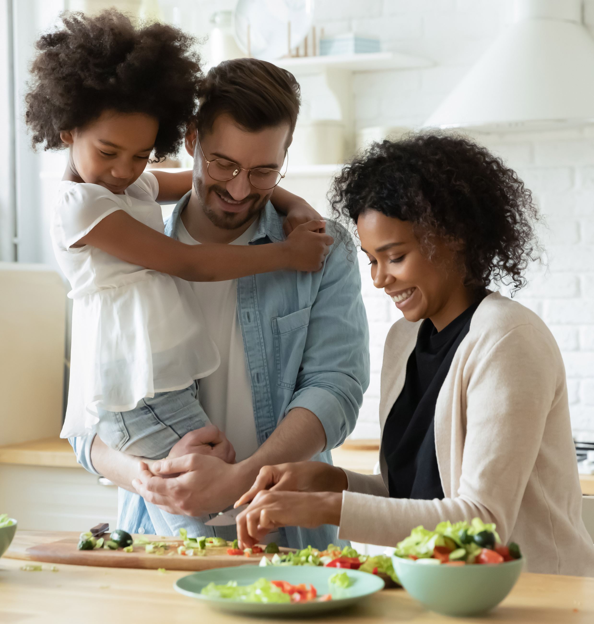 croppped Happyyoungdiverseparentshavefunteachlittlebiracialdaughtercookingoverjoyedmultiracialfamily