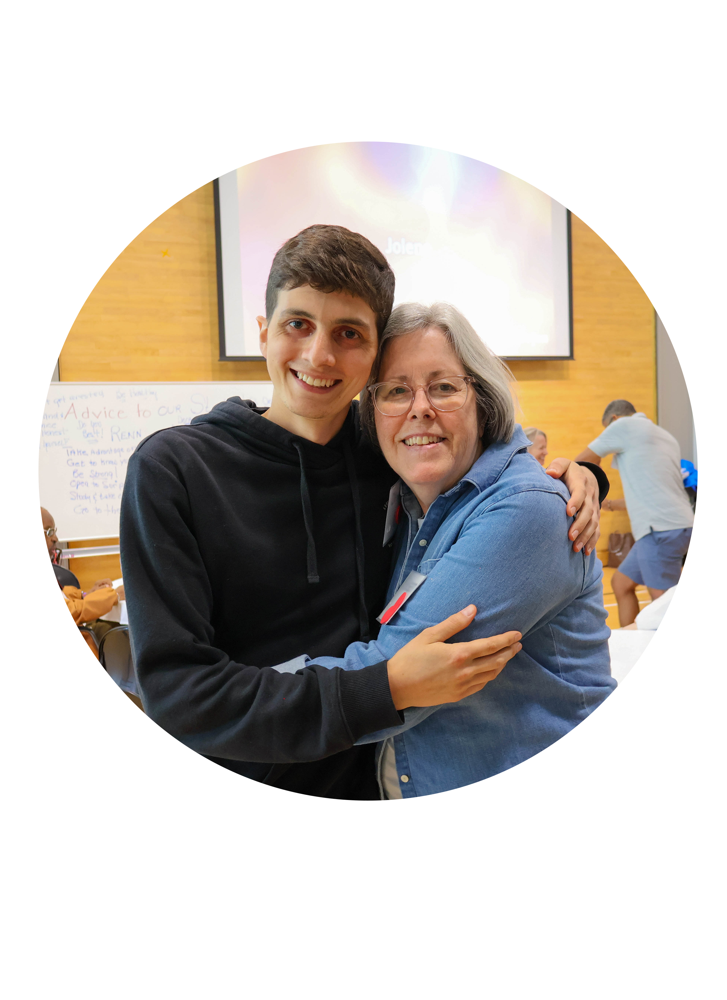 A volunteer hugging a Friend at the R Place Program 