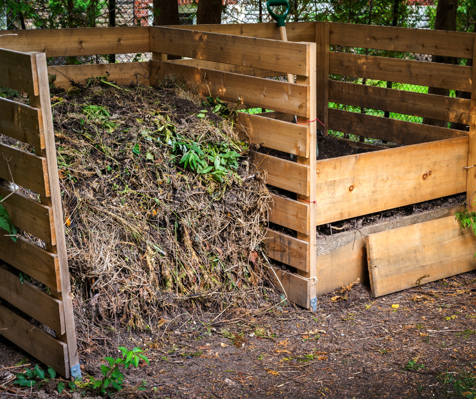 Wooden bins holding compost and yard waste